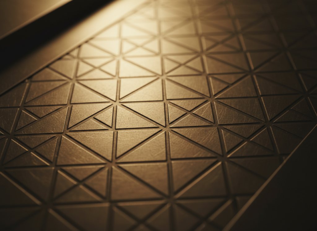 Geometric stone relief in warm light